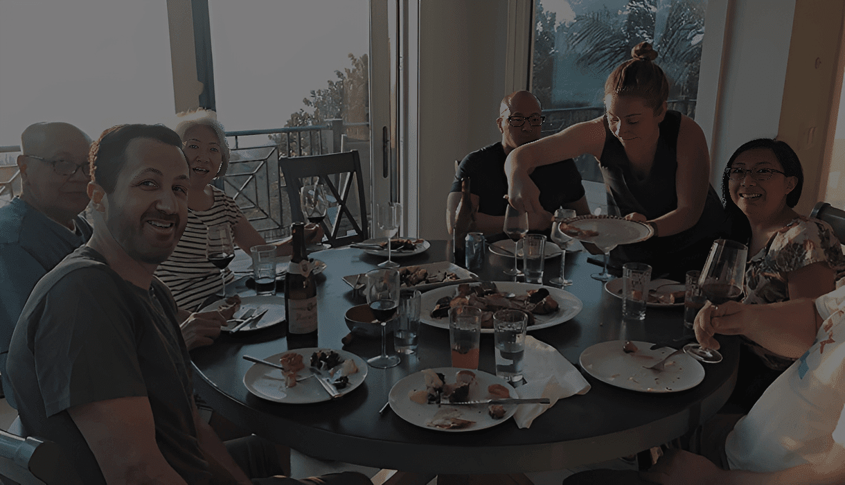 People gathered around dining table
