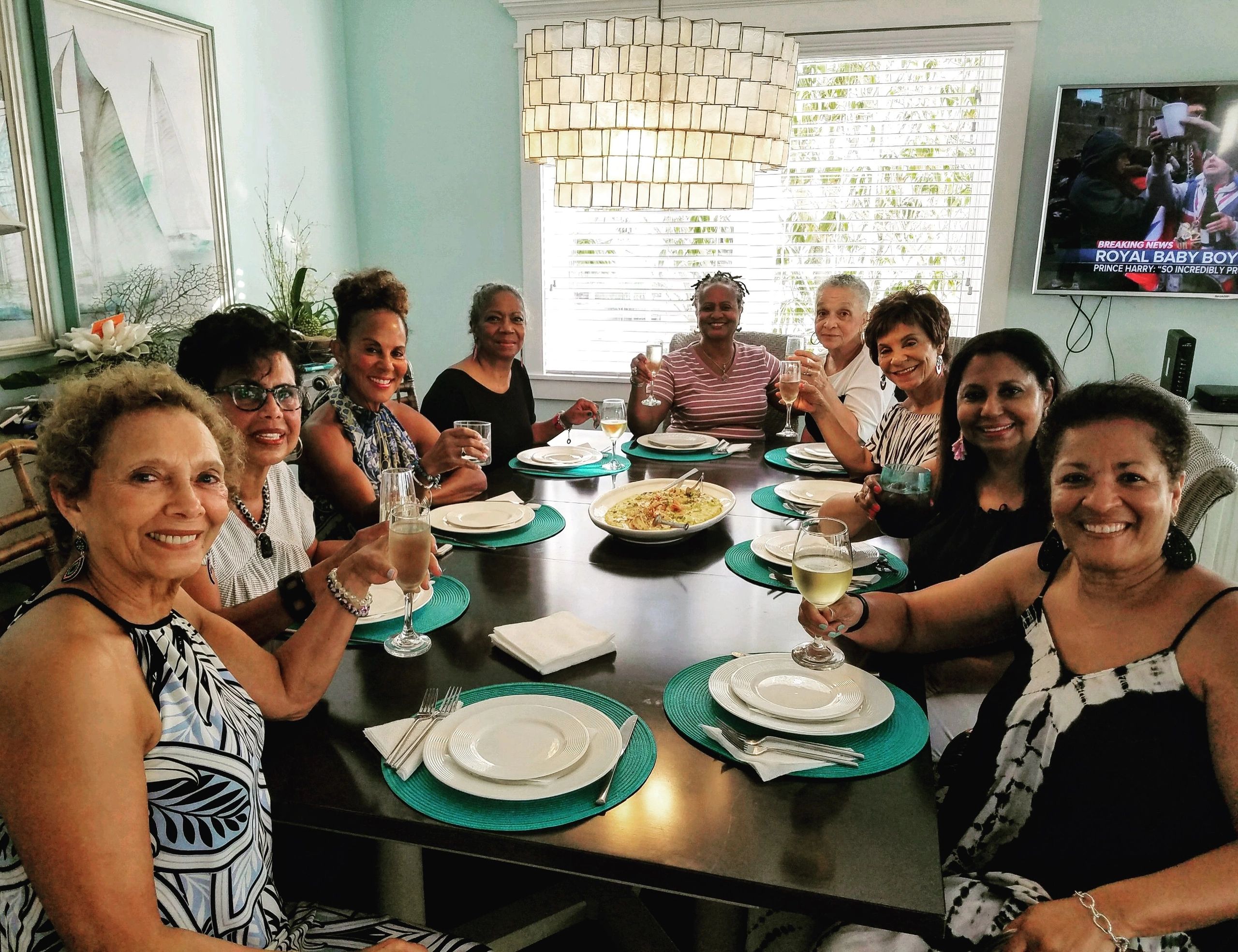 Friends gathered around dining table