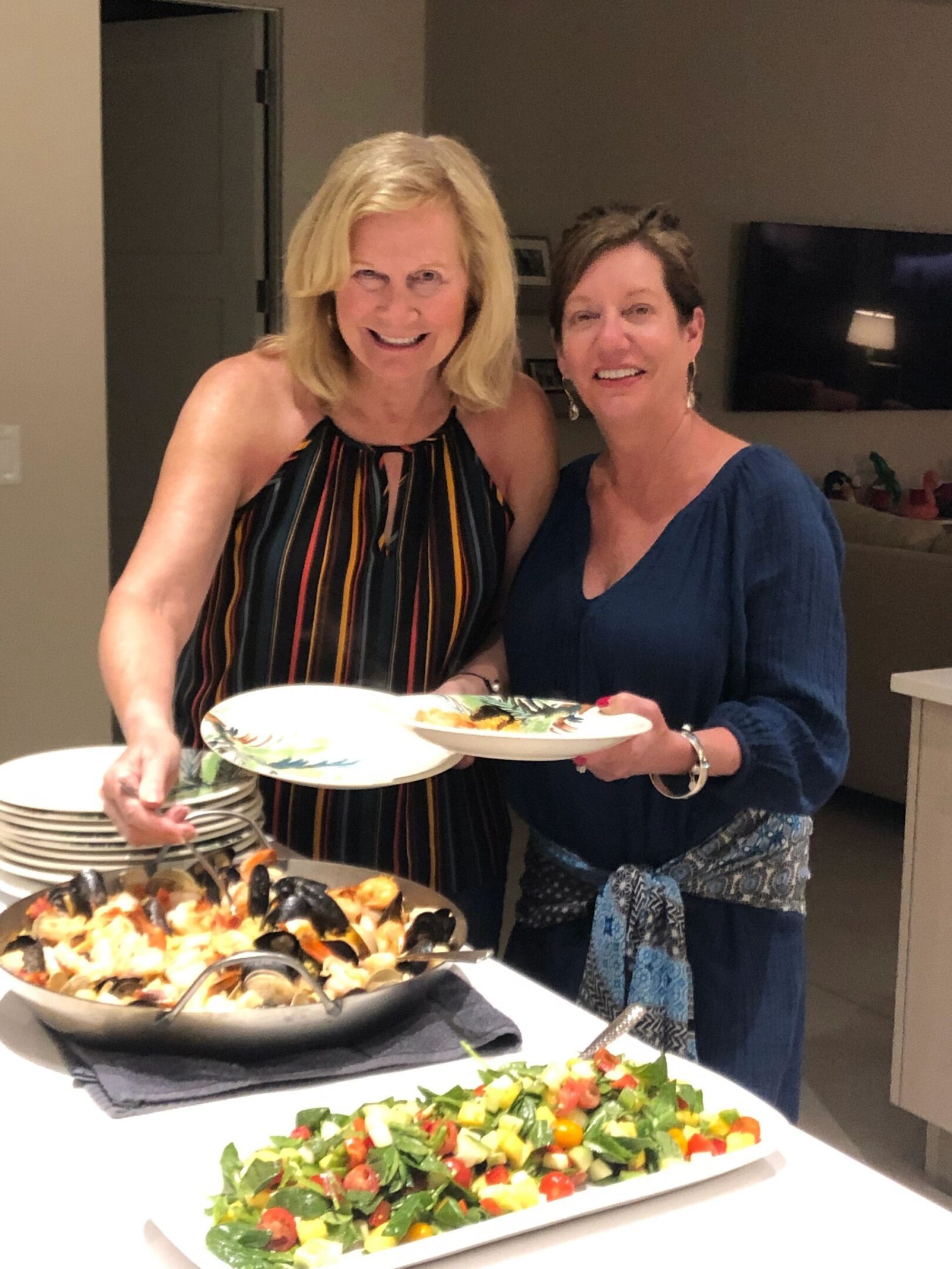 Smiling women at a dinner party