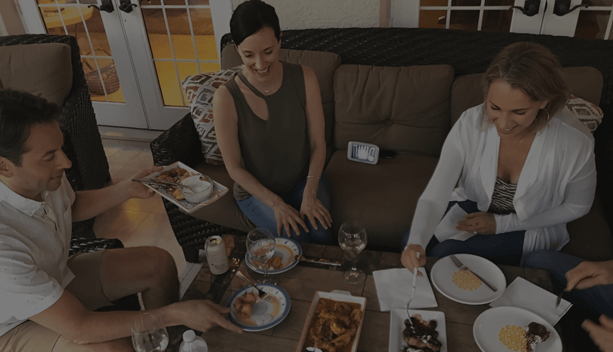 Group dining with laughter